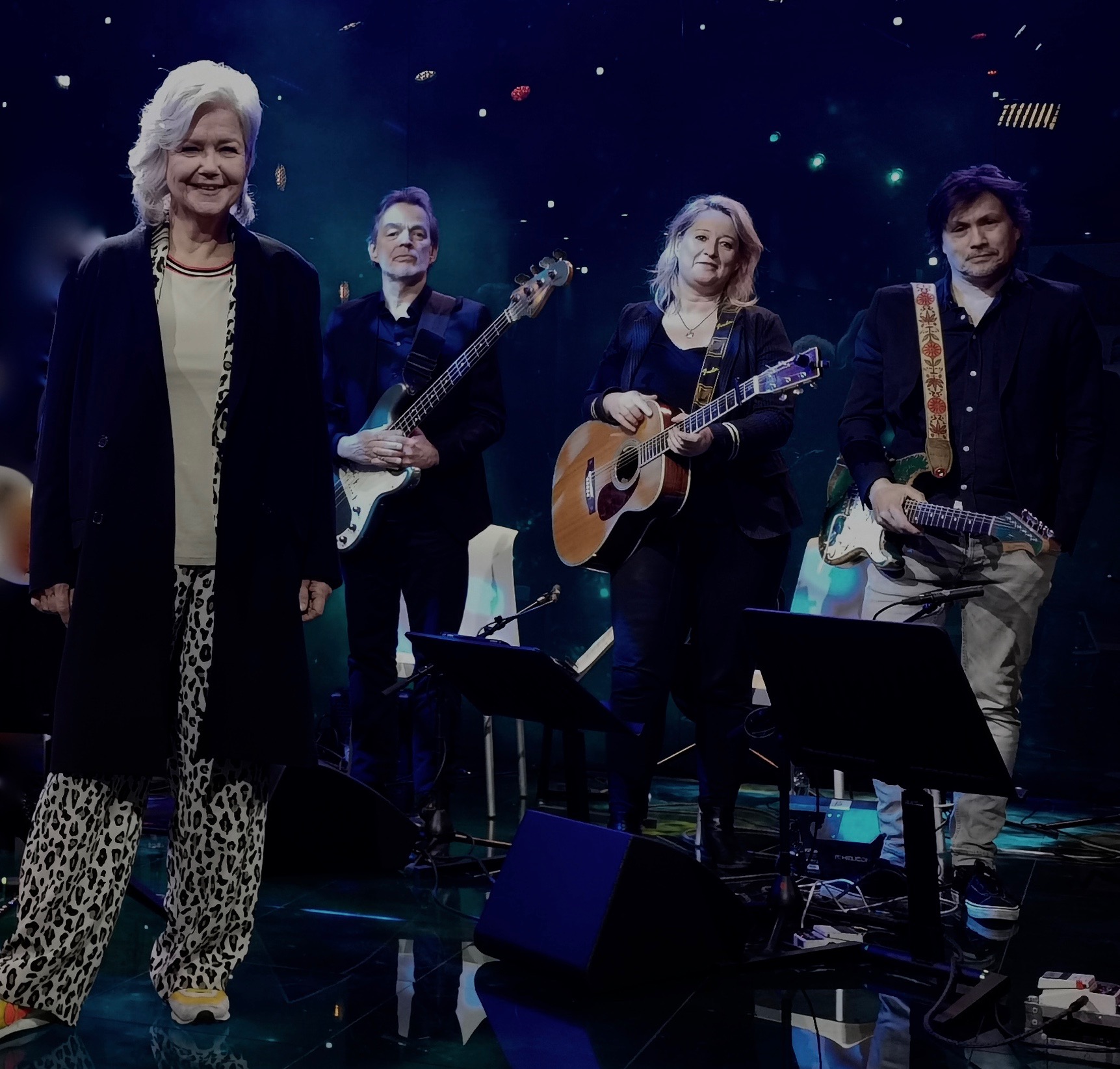 Mathilde Santing and her band performing on stage